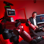 University of Maryland computer scientist Yiannis Aloimonos (center) is developing robotic systems able to visually recognize objects and generate new behavior based on those observations. DARPA is funding this research through its Mathematics of Sensing, Exploitation and Execution (MSEE) program. (University of Maryland Photo)