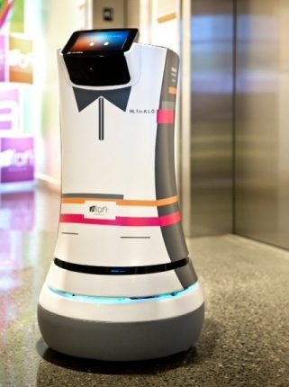 Botlr, the robotic butler is currently handing out toothbrushes and extra towels .