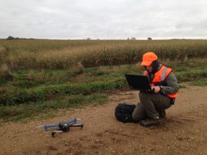 Mark Ditmer prepares to launch drone for testing near bear. (Photo Credit: Jessie Tanner)