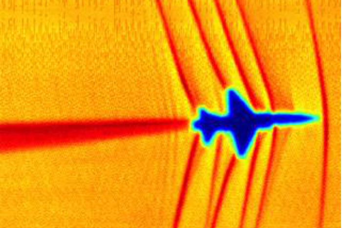 Schlieren image of shock waves created by a T-38C in supersonic flight. (Image via NASA)