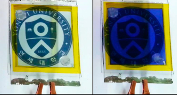 A display changes colors, powered solely by a new hybrid solar-energy device. ( Image Credit: American Chemical Society)