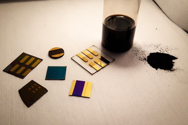 Sample of pulverized coal with test devices made from coal. (Image via MIT)