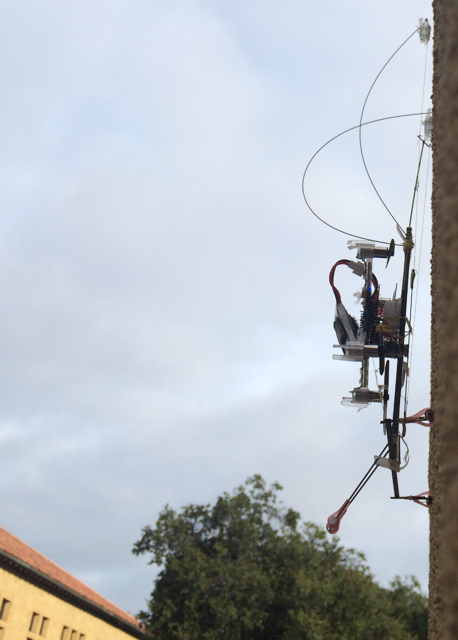 SCAMP climbs a clock tower. (Image via Stanford University)