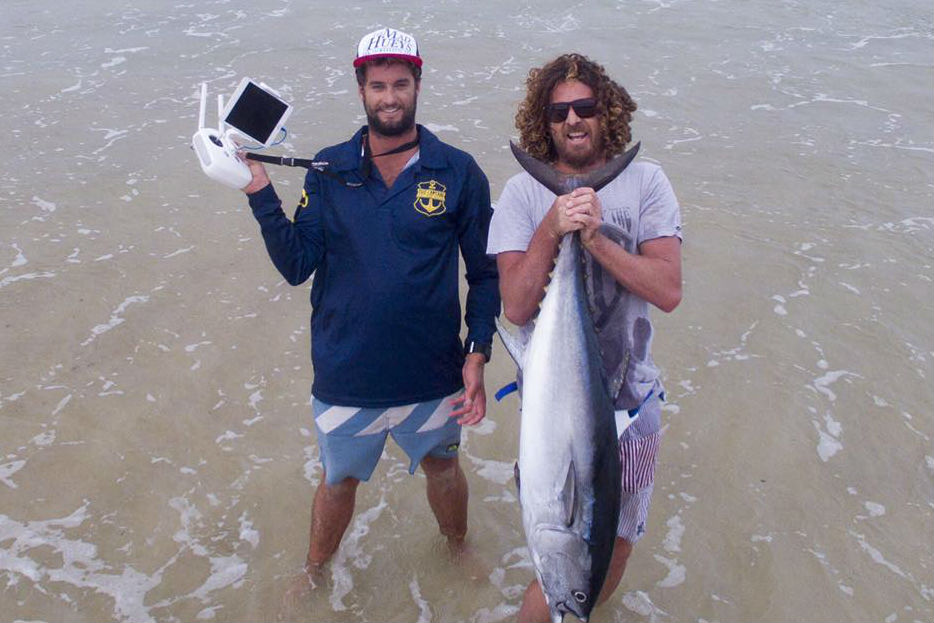 Jordan Maclean and Byron Leal use a drone to help catch longtail tuna. (Image via Sea Ulcer Aerial Media/Facebook)
