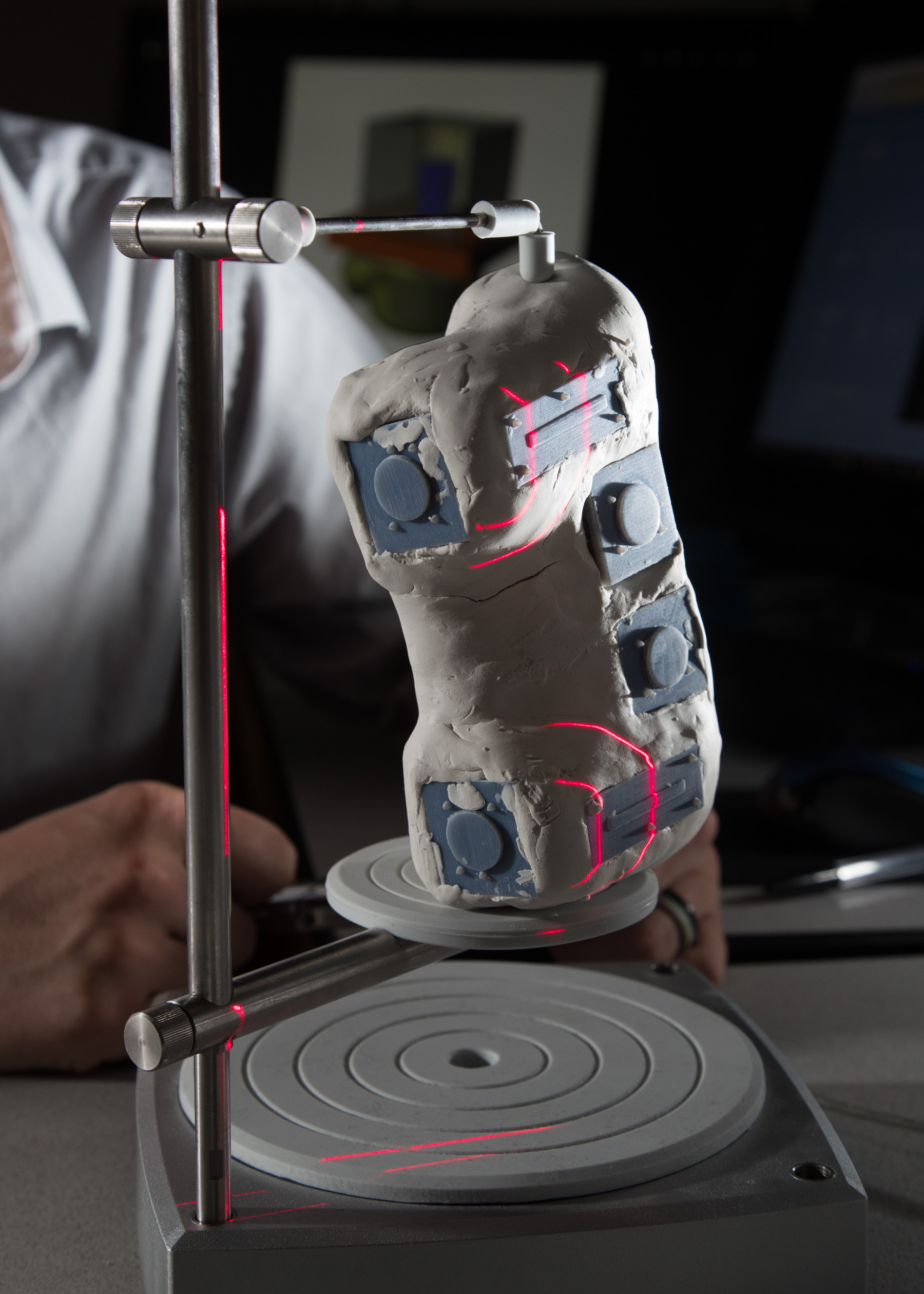 Mike Jones 3D printing model out of clay. student- Casey Walker using a laser scanner. (Image Credit: Mark A. Philbrick/BYU Photo)