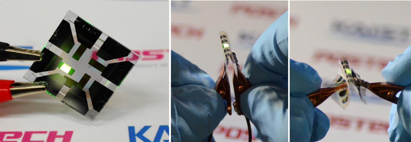 This picture shows an OLED with the composite structure of TiO2/graphene/conducting polymer electrode in operation. (Image Credit: KAIST)