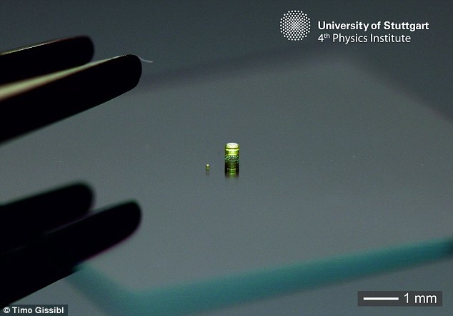 Multi-lens system with a diameter of 600 µm next to a doublet lenses with a diameter of 120 µm. (Image via )