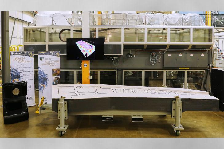 A 3D printed trim tool developed by ORNL and Boeing to be used in building Boeing’s 777X passenger jet has received the title of largest solid 3D printed item by Guinness World Records. (Image via ORNL)