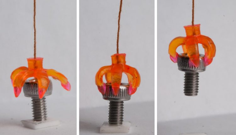 In this series, a 3-D printed multimaterial shape-memory minigripper, consisting of shape-memory hinges and adaptive touching tips, grasps a cap screw. (Image Credit: Qi (Kevin) Ge)