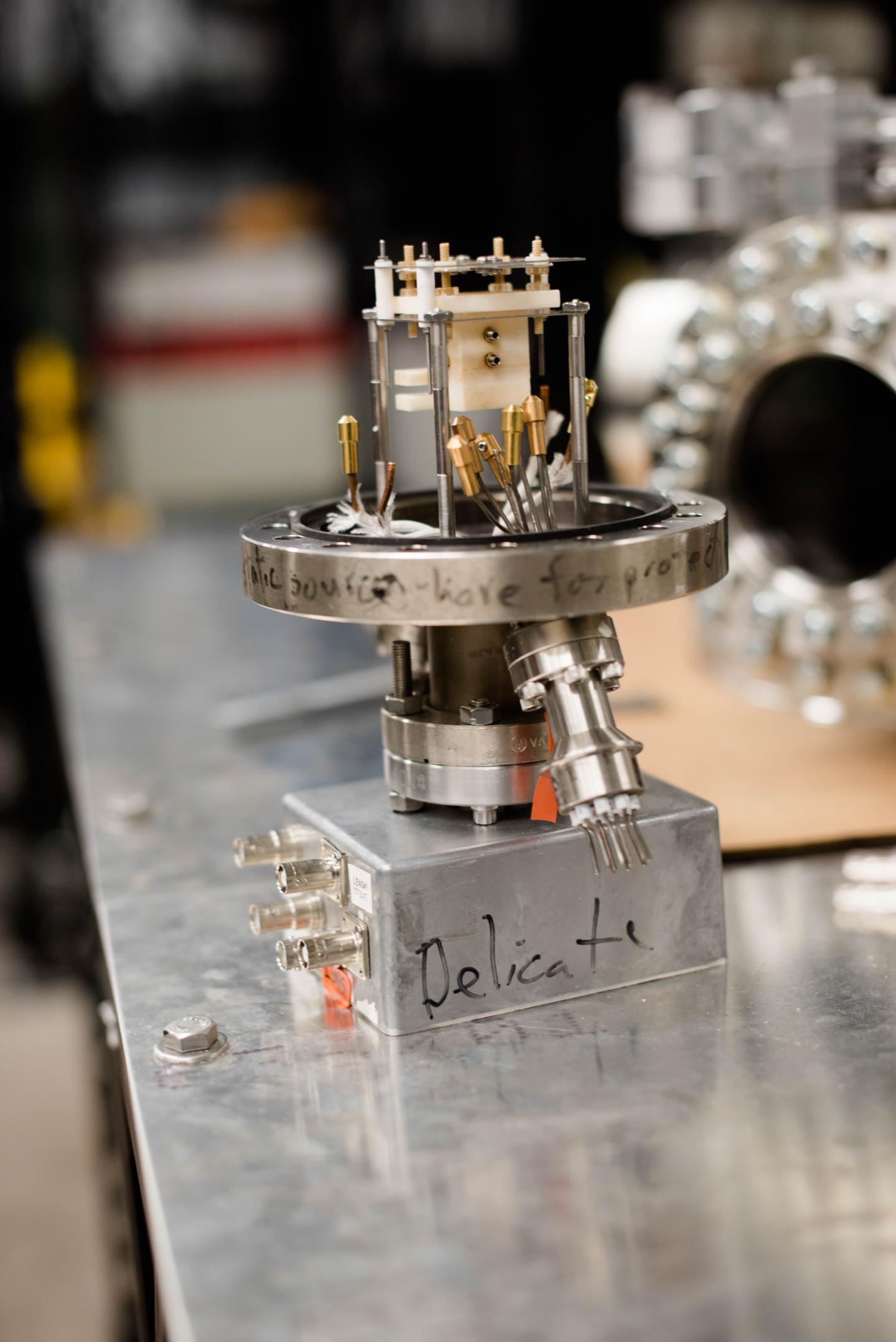 A nanosatellite thruster, a device which has attracted a lot of attention in aerospace research, but engineers are still working on the best materials to use to propel nanosatellites through space. (Image Credit: Michigan Tech/ Nathan Shaiyen)