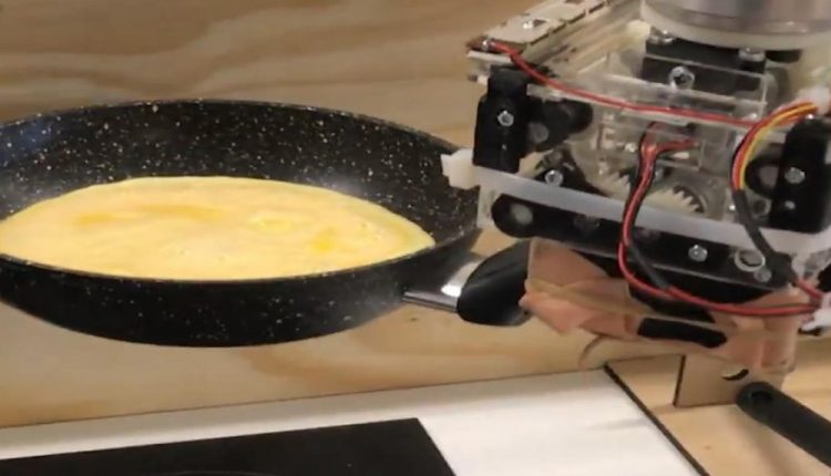Robot Arm Prepares Omelette large