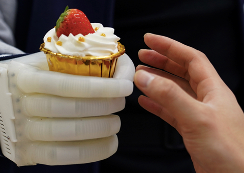 An MIT-developed inflatable robotic hand gives amputees real-time tactile control. The smart hand is soft and elastic, weighs about half a pound, and costs a fraction of comparable prosthetics. Credit: Courtesy of Xuanhe Zhao, Shaoting Lin, et al