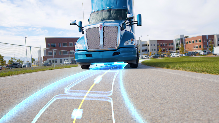 An electric semi truck charges while driving on a test dynamic wireless power transfer (DWPT) roadway located at Utah State University. Photo credit: ASPIRE  