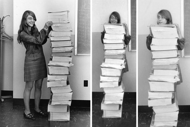 Computer scientist Margaret Hamilton poses with the Apollo guidance software she and her team developed at MIT. (Image Credit: MIT Museum)