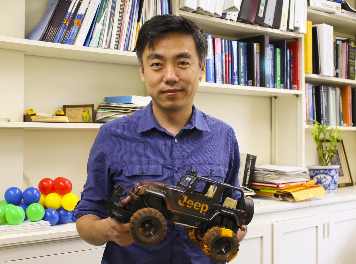 Xudong Wang has developed a new way to harvest energy from rolling tires. (Image credit: UW-Madison College of Engineering)